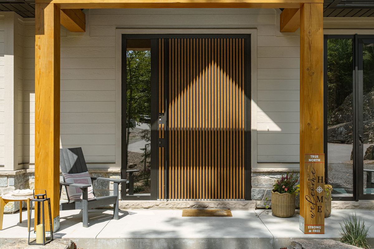 Covered front porch and entry with timber posts