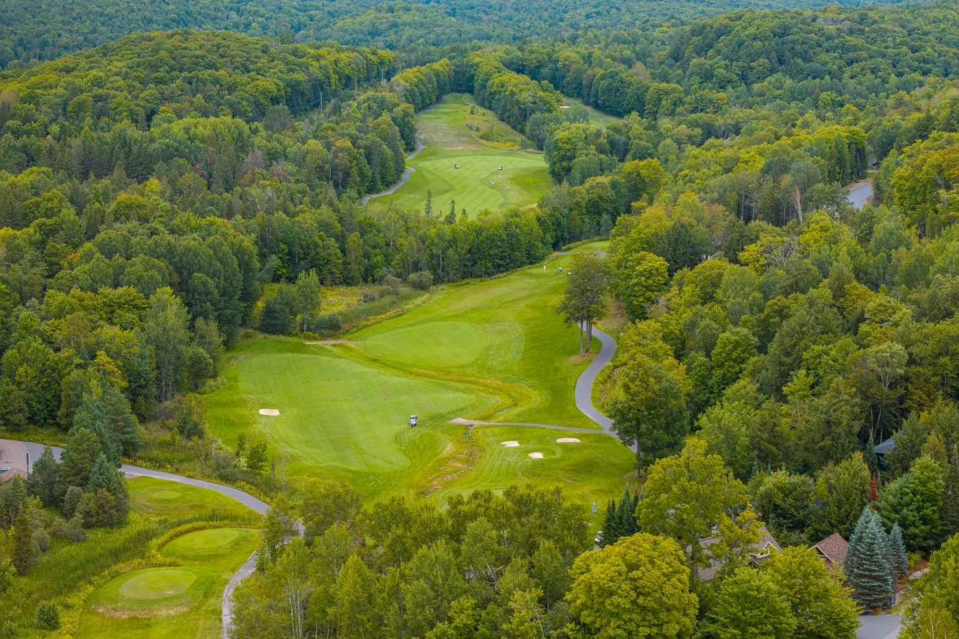 Aerial view of the Deerhurst Highlands golf course, fairways running through the forest