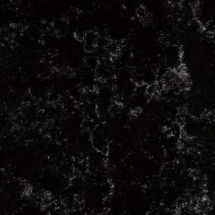 Near-black quartz slab with pale flecking