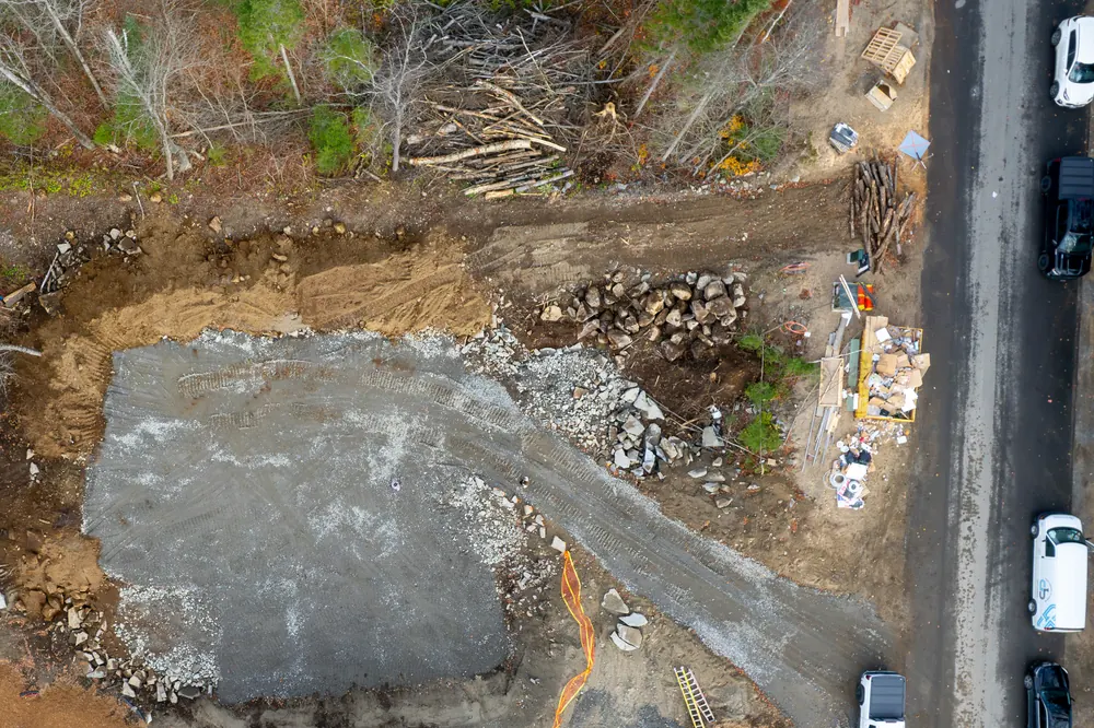 The cleared and graded building pad on Lot 8, ready for a foundation