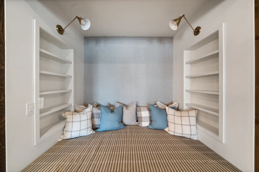 Built-in window seat at Hemlock Point flanked by shelving